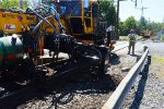 Close Up of Old RR tie Being Removed.  I am behind the guard rail seen here.  